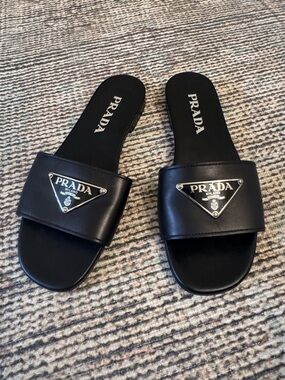 Prada Black Leather Slide Sandals with Silver Triangle Logo